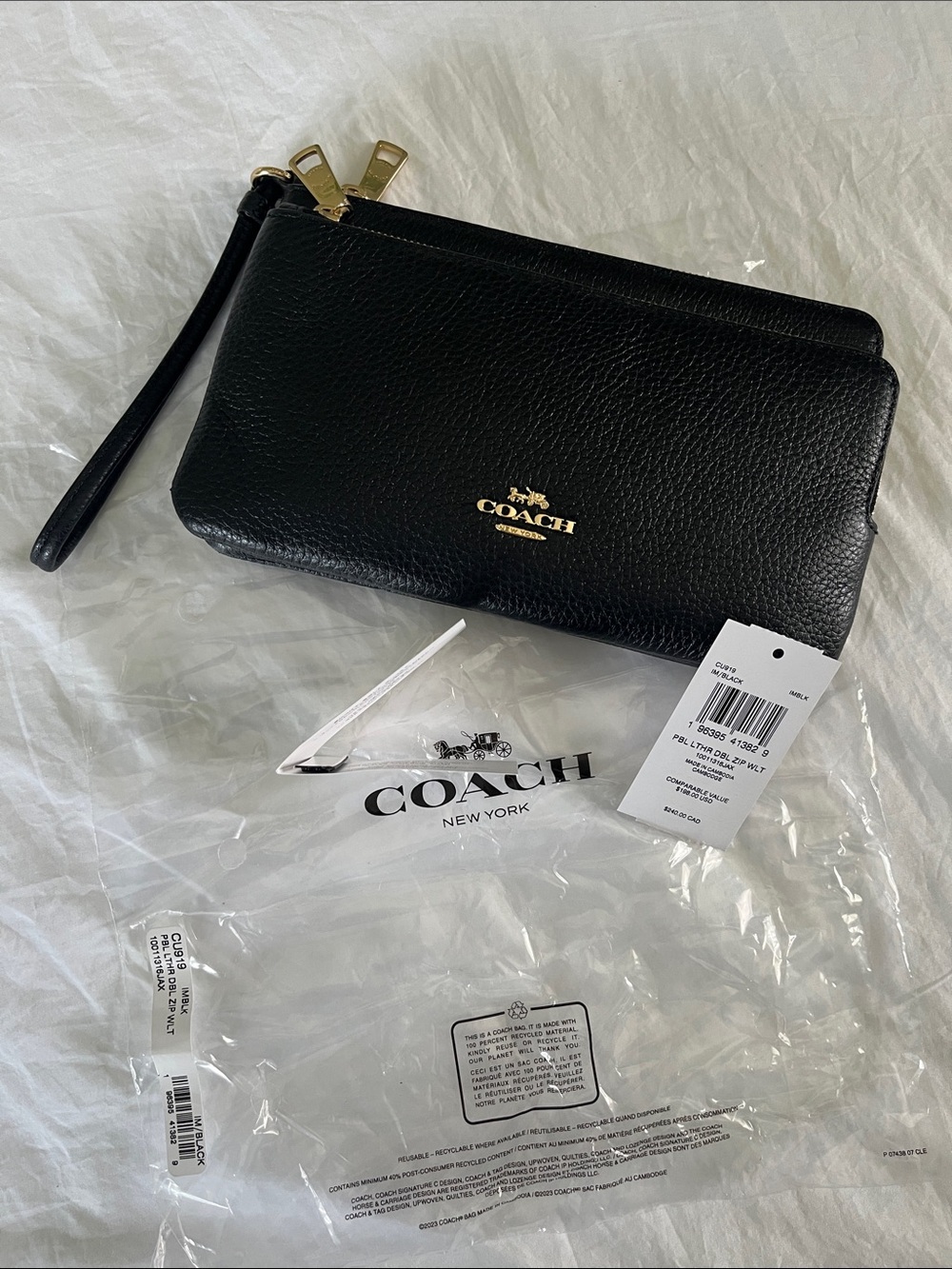 Coach Black Pebbled Leather Wristlet with Gold Hardware